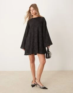 Gina Tricot Jacquard Sheer Mini Swing Dress With Satin Bow Back Detail In Black For Women