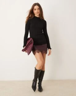 Gina Tricot Long Sleeve Ribbed Knit Top With Fluted Funnel Neck And Cuffs In Black For Women -Curated Apparel Shop 207736904 4