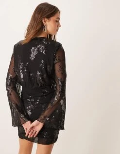 Gina Tricot Mini Dress With Wrap Front In Black With Textured Shimmer Jacquard Floral Pattern For Women 9 Gina Tricot Mini Dress With Wrap Front In Black With Textured Shimmer Jacquard Floral Pattern For Women -Curated Apparel Shop 207737660 3