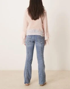 Gina Tricot Low Rise Flare Leg Jeans With Front Panel Detail In Mid Wash Blue For Women -Curated Apparel Shop 207952382 3