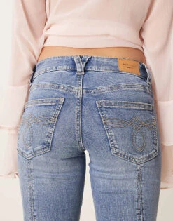 Gina Tricot Low Rise Flare Leg Jeans With Front Panel Detail In Mid Wash Blue For Women -Curated Apparel Shop 207952382 4