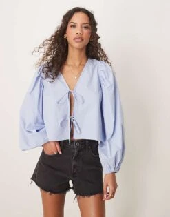 Gina Tricot Blouse Top With Tie Front And Volume Sleeves In Blue For Women -Curated Apparel Shop 207952436 1 blue 1